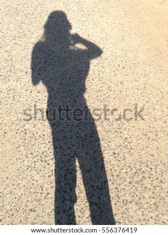 Similar – Shadow of a woman on the beach