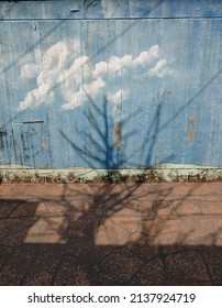 Shadows and clouds reflected on the wall