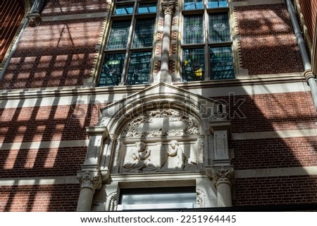 Shadows fall on the wall of a building in Amsterdam
