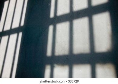 Shadows Of Jail Cell Bars