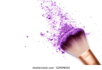 shadows and makeup brush isolated on white