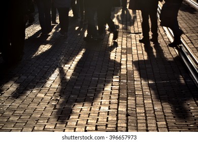 Shadows Of People Walking In The Streets Of Amsterdam