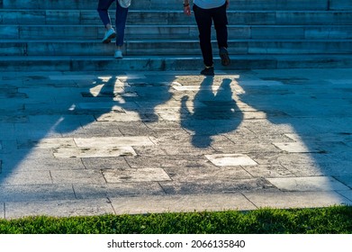shadows and silhouettes of people climbing the stairs at sunset. start and labor concept. Selective focused on background - Shutterstock ID 2066135840