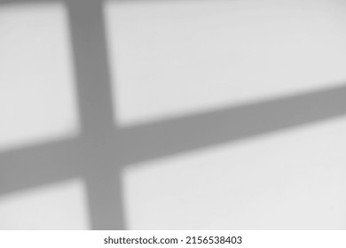 Shadows Of Window Lines On A Concrete Stone Wall In A Bright Room Background. Abstract, Geometry, Light Concept