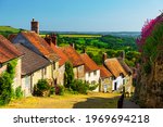 Shaftesbury, Dorset, sun drenched cottages on the iconic Gold Hill where Ridley Scott shot the famous Hovis advert