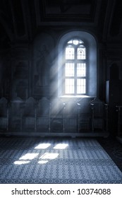 Shafts Of Light Stream Through Stained Glass Window Inside A Church