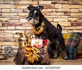 A Shaggy Dog With A Bunch Of Bagels Around His Neck Stands Near A Tea Party Set