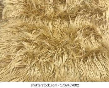 Shaggy Faux Fur Texture In Tan Rug Texture For Background