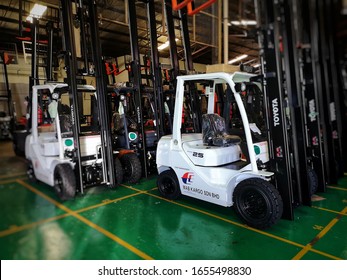 Shah Alam, Malaysia - 18 February 2020 : Nicely Parked A New Toyota Forklifts Inside Warehouse At Shah Alam, Malaysia With Selective Focus. 