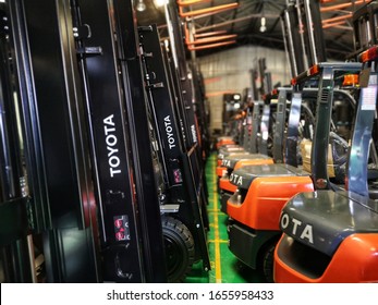 Shah Alam, Malaysia - 18 February 2020 : Nicely Parked A New Toyota Forklifts Inside Warehouse At Shah Alam, Malaysia With Selective Focus. 