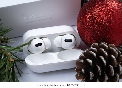 Shah Alam, Malaysia - Dec 16, 2020:  New Apple Airpods Pro On A White Background. Modern Technologies, Christmas Giveaway