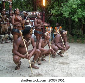 SHAKALAND, SOUTH AFRICA - CIRCA NOVEMBER 2011: Unidentified Zulu men wearing traditional Zulu warrior clothing at Shakaland Zulu Cultural Village, KwaZulu-Natal, South Africa 