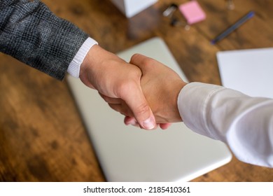 Shake Hands Near Laptop And Desktop, Working Relationship