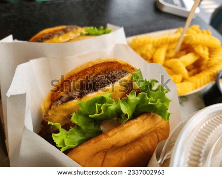 shake shack hamburger and frenchfries