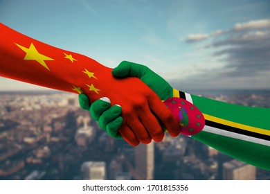 Shaking Hands China and Dominica - Powered by Shutterstock