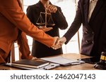 Shaking hands, Lawyers offer legal guidance, stand for clients in court, and aid with legal paperwork. analyze laws to safeguard clients