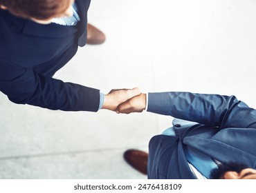 Shaking hands, welcome and business men in office with b2b deal, collaboration or agreement. Professional, meeting and aerial view of lawyers with handshake for greeting or partnership in workplace. - Powered by Shutterstock