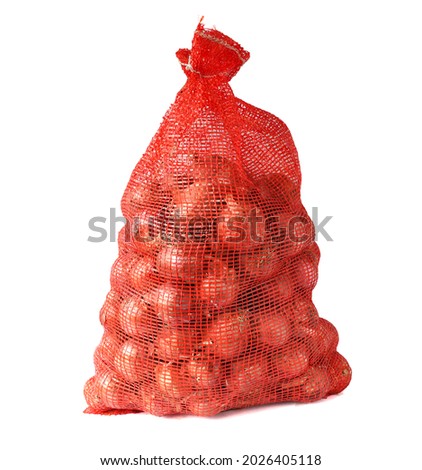 Shallots in a net over white background