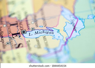 Shallow Depth Of Field Focus On Geographical Map Location Of Lake Michigan Off Inland Of Canada On Atlas