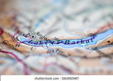 Shallow Depth Of Field Focus On Geographical Map Location Of Lake Baikal Russia Europe Continent On Atlas