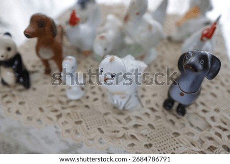 Shallow depth of field (selective focus) details with Romanian communist era ceramic trinkets (bibelouri)
