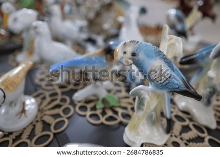 Shallow depth of field (selective focus) details with Romanian communist era ceramic trinkets (bibelouri)