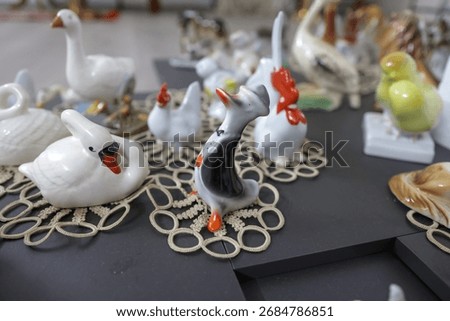 Shallow depth of field (selective focus) details with Romanian communist era ceramic trinkets (bibelouri)