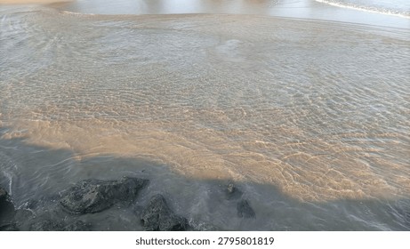 A shallow sandy river flow