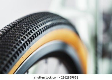 Shallow Tread Of A Bicycle Tubeless Tire With A Brown Sidewall