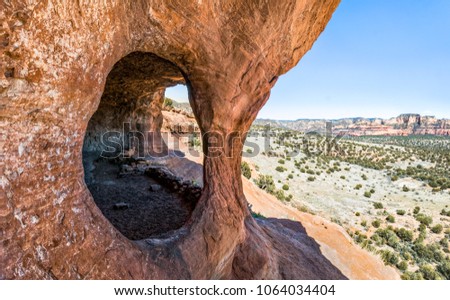 Shamans Cave, also know as Robbers Roost or Hideout Cave, overlooks the beautiful Arizona landscape of Coconina National Forest about twenty miles from the town of Sedona.
