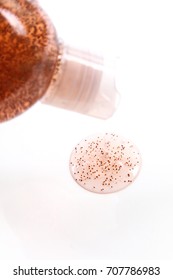 Shampoo containing plastic microbeads poured out from shampoo