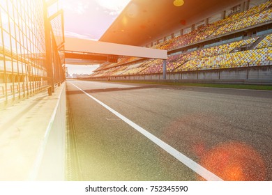 ShangHai, 18 AUG 2017 China: Empty Race Track , Formula 1 Circuit With Patron Grandstand Alongside. Concept Of Spectatorship For Decisive Sport Moments.Empty Board Above An International Racetrack.