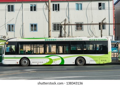 SHANGHAI - APRIL 7: Electric Powered Hybrid Bus Charging At The City Of Shanghai In China On April 7th, 2013