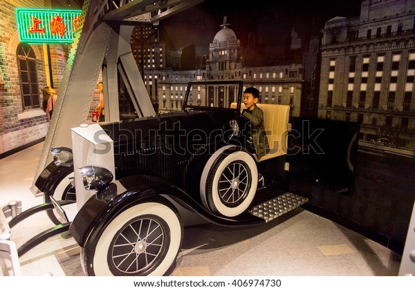 SHANGHAI, CHINA - APR 3, 2016: Car at the Interior\
of the Shanghai Madame Tussauds wax museum. Marie Tussaud was born\
as Marie Grosholtz in\
1761