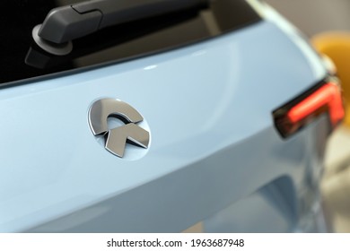 Shanghai, China. April 24, 2021. Editorial Use Only. Logo Nio On The Back Hatch Of The Blue Electric Car.