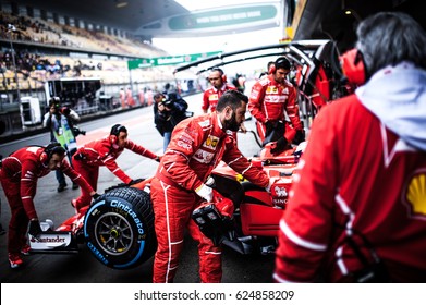 Shanghai, China - April 6-9, 2017: Pitlane Activity Mechanics In Scuderia Ferrari F1 Team At Formula One Chinese Grand Prix At Shanghai Circuit.