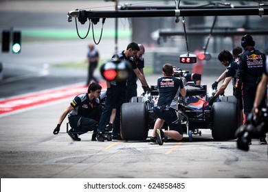Shanghai, China - April 6-9, 2017: F1 pit stop Scuderia Toro Rosso team at Formula One Chinese Grand Prix at Shanghai Circuit.