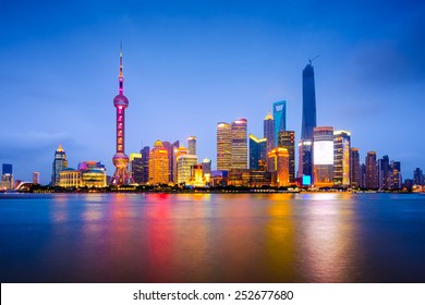 Shanghai, China city skyline on the Huangpu River. - Shutterstock ID 252677680