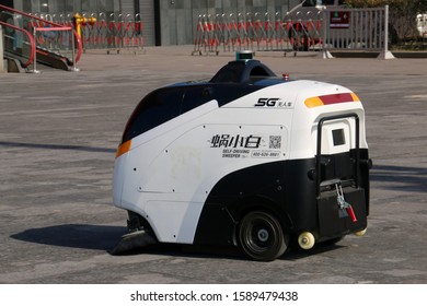 Shanghai, China - December 6 2019: An Autonomous Street Sweeper Vehicle