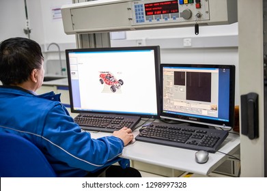 Shanghai, China, China - January 13, 2016: In the Shanghai Volkswagen R&D lab, engineers are drawing car drawings and conducting car research and development.