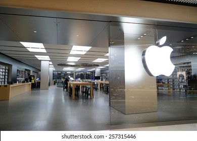 SHANGHAI, CHINA - March 2. 2015: Interior of the new IAPM Shopping Mall downtown in old French Concession. Apple store inside Just after Chinese new year at March 2. 2015 Shanghai, China