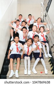 Shanghai, China - May 11, 2017: Students Of Shanghai High School Sit In The Corridor Stairs Of The School Building