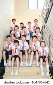 Shanghai, China - May 11, 2017: Students Of Shanghai High School Sit In The Corridor Stairs Of The School Building