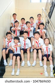 Shanghai, China - May 11, 2017: Students Of Shanghai High School Sit In The Corridor Stairs Of The School Building