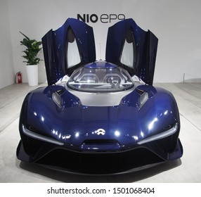 Shanghai/ China - May 26 2019: Front View Of A Dark Blue Nio EP9 Super Car On Display With Gull Wing Doors Open At The Shanghai Super Classic Car Show