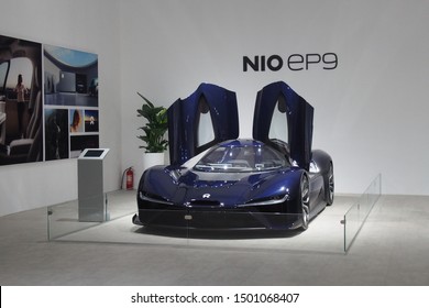 Shanghai/ China - May 26 2019: Front View Of A Dark Blue Nio EP9 Super Car On Display With Gull Wing Doors Open At The Shanghai Super Classic Car Show