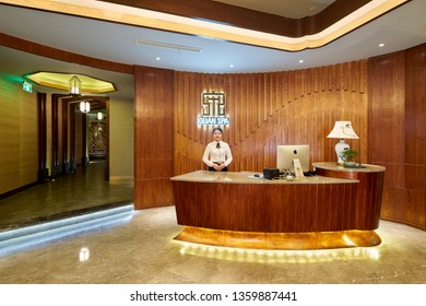 Shanghai, China, China, May 31, 2018: The Front Desk Service Lady At The Fuquan Spa On Hengshan Road In Shanghai Is Welcoming New Guests.