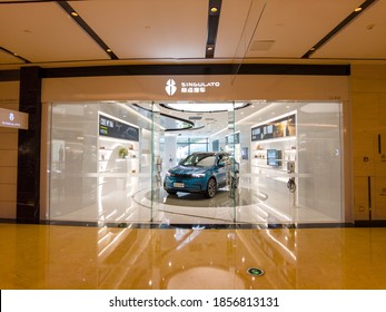 Shanghai, China - Nov 16, 2020: Singulato Motors Store And IS6 Model In Downtown Singulato Motors Is The New Energy Vehicle Brand Of Chi Che-hung Technology Co., Ltd,.. Business And Finance Concept