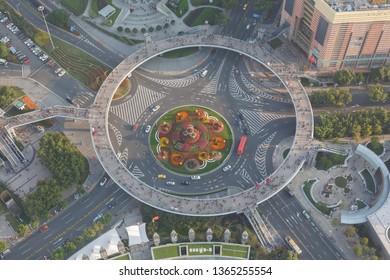 SHANGHAI, CHINA - October 21, 2017: Aeriel View On Pedestrian Circle Bridge At Shanghai Pudong. Every Day Thousands Of Tourists Visit The Bridge To Take Photos Of The Famous Shanghai Skyline.