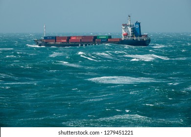 SHANGHAI, CHINA - OCTOBER 30, 2018: Rough Seas And Waves Batter The Side Of Small Container Ship Off The Coast